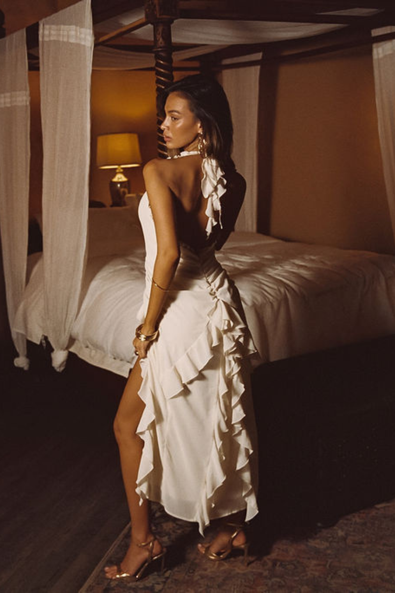 Detail shot of the Aria Cream Halter Maxi Dress highlighting the halter elements.