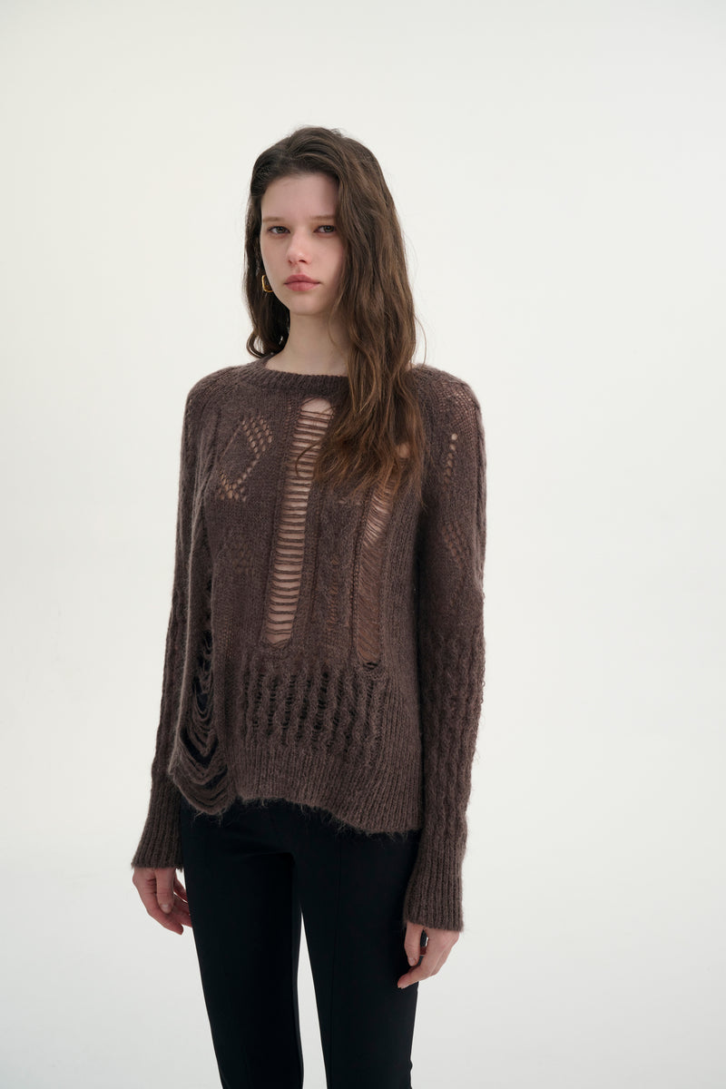 Distressed relaxed sweater