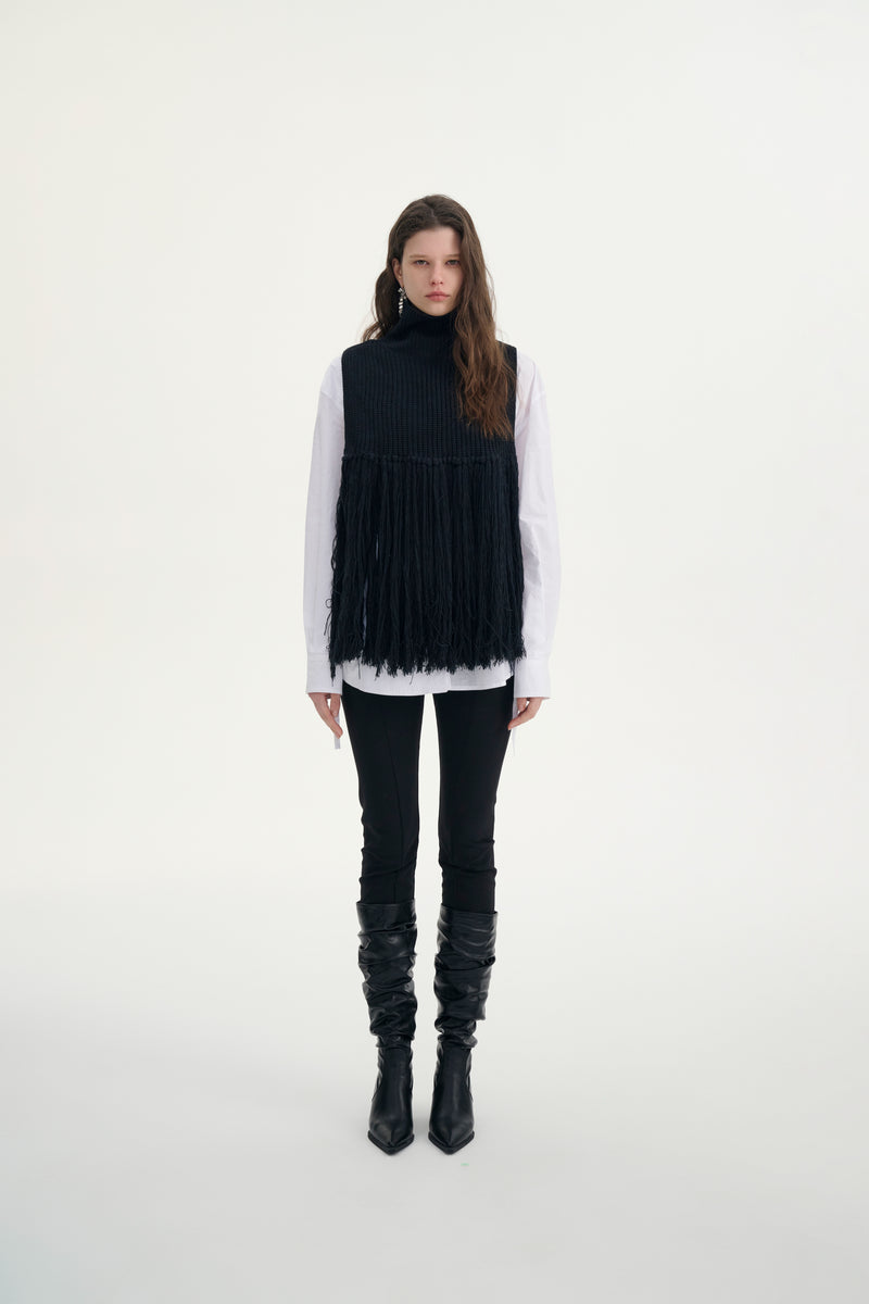 Fringed turtleneck vest