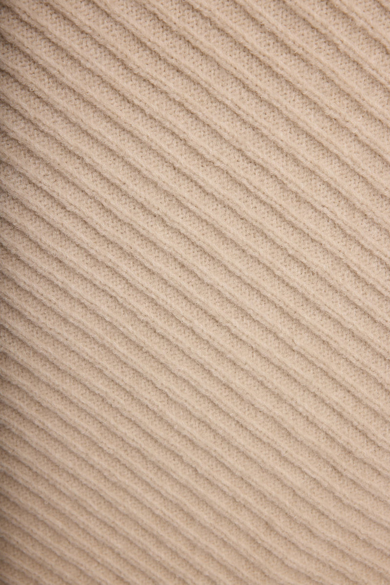 Additional view of the Mod Cream Asymmetrical Skirt from a different perspective.