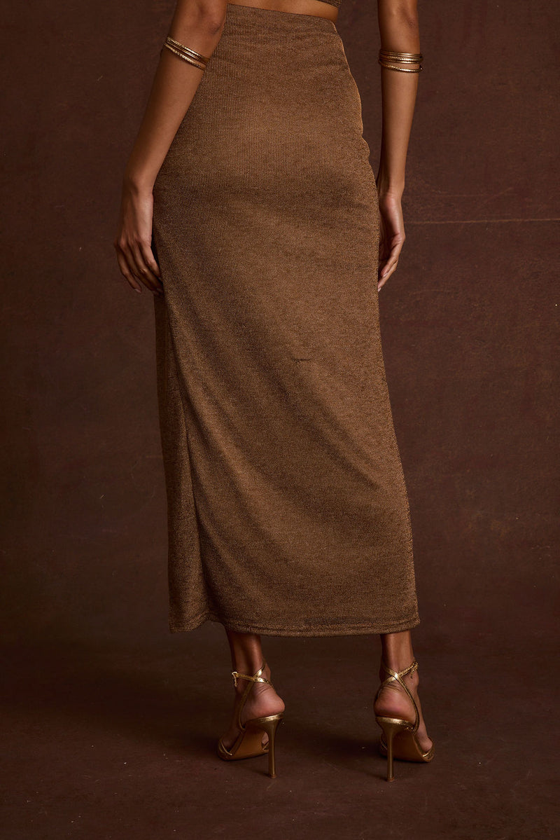 Close-up of the Toulouse Bronze Maxi Skirt showcasing the fabric texture and design details.