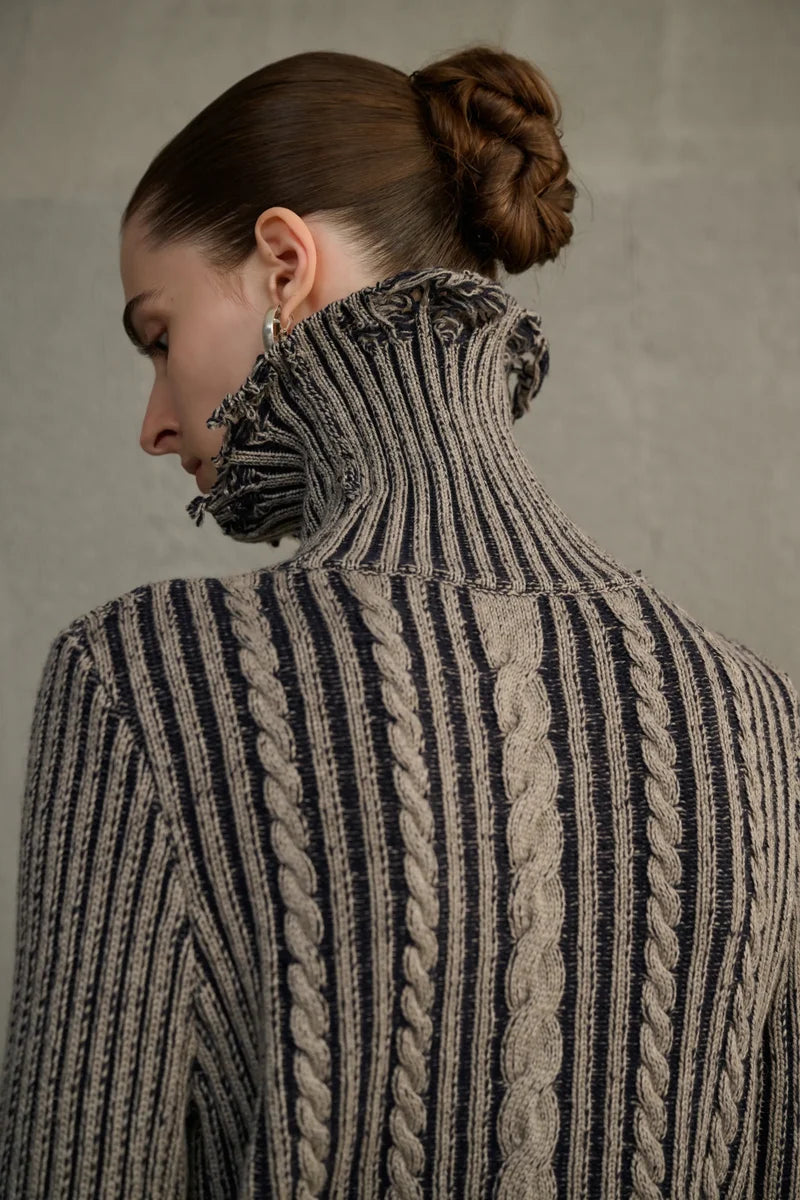 Turtleneck cable knit sweater