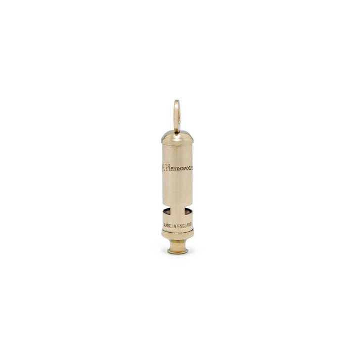 Acme brass metropolitan police whistle upright on white background