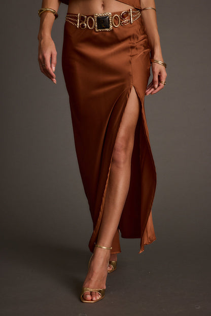 Full-length view of the maxi skirt showing the drape and movement.