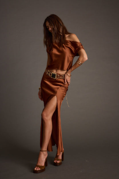 Lifestyle shot of the maxi skirt styled for day-to-night versatility.