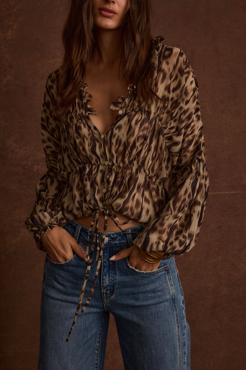 Close-up of the Alba Leopard Chiffon Long Sleeve Blouse showcasing the chiffon texture and craftsmanship.