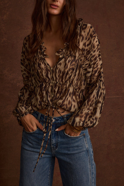 Close-up of the Alba Leopard Chiffon Long Sleeve Blouse showcasing the chiffon texture and craftsmanship.
