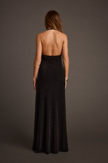 Close-up of the Alondra Black Plunge Maxi Dress showcasing the fabric texture and design details.