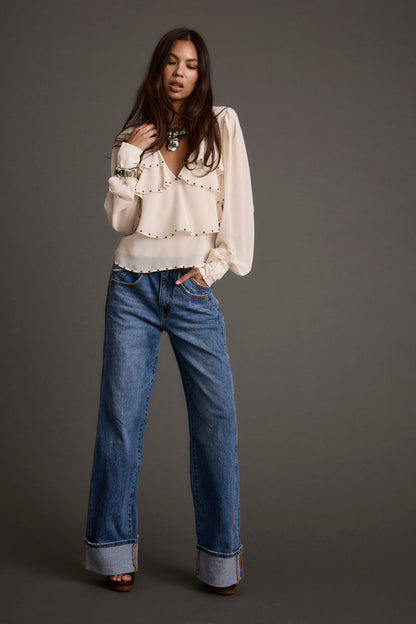 Detail shot of the Alyssa Ivory Studded Blouse highlighting the design elements.