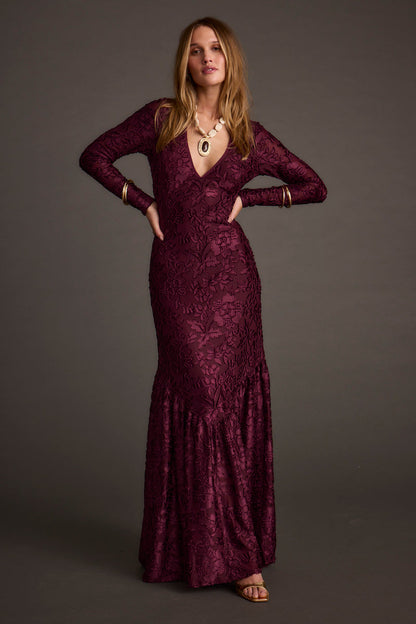 Full-length view of the maxi dress showing the drape and movement.
