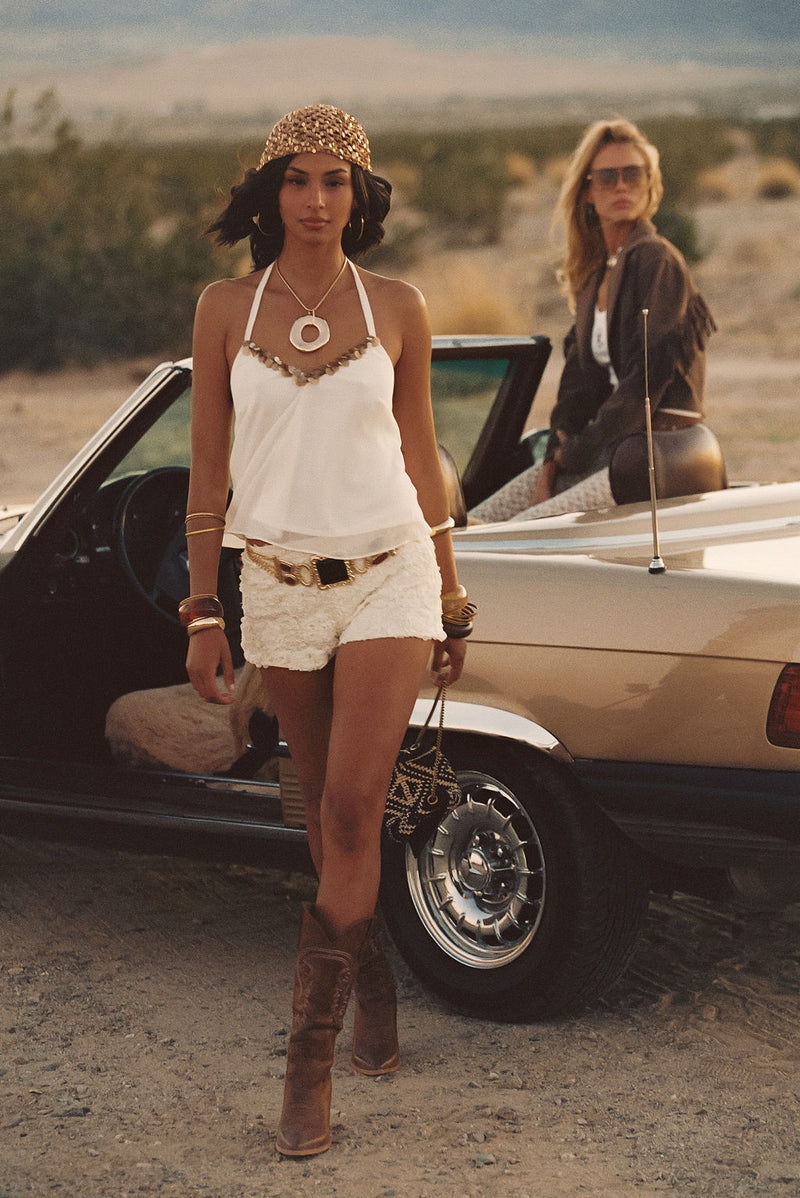 Annabel Ivory Sequin Halter Top styled in a complete look from an alternate angle.