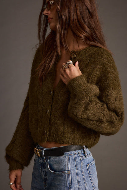 Close-up of the Archie Olive Cropped Cardigan showcasing the fabric texture and design details.