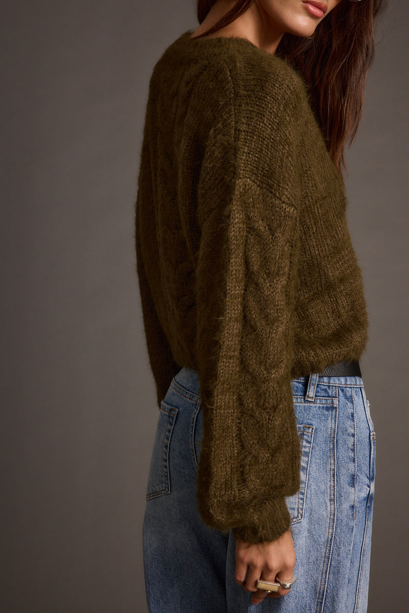 Archie Olive Cropped Cardigan styled in a complete look from an alternate angle.