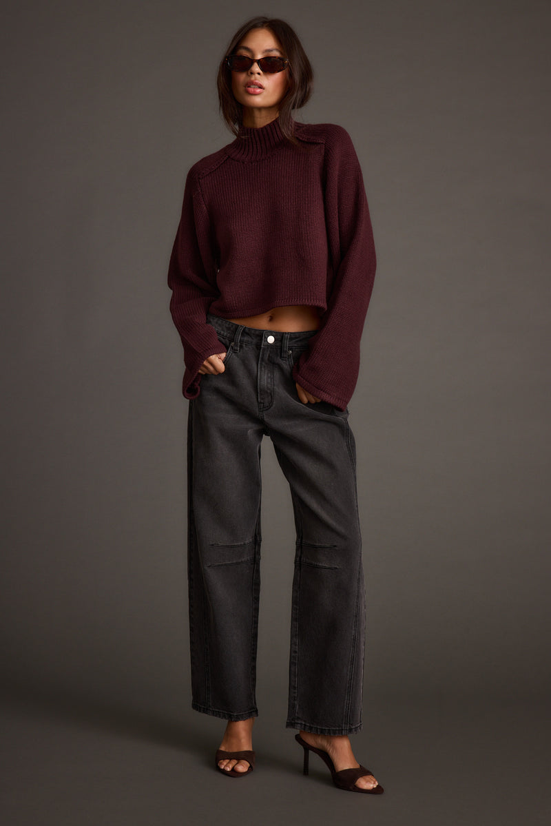 Close-up of the Arden Plum Cropped Sweater showcasing the fabric texture and design details.