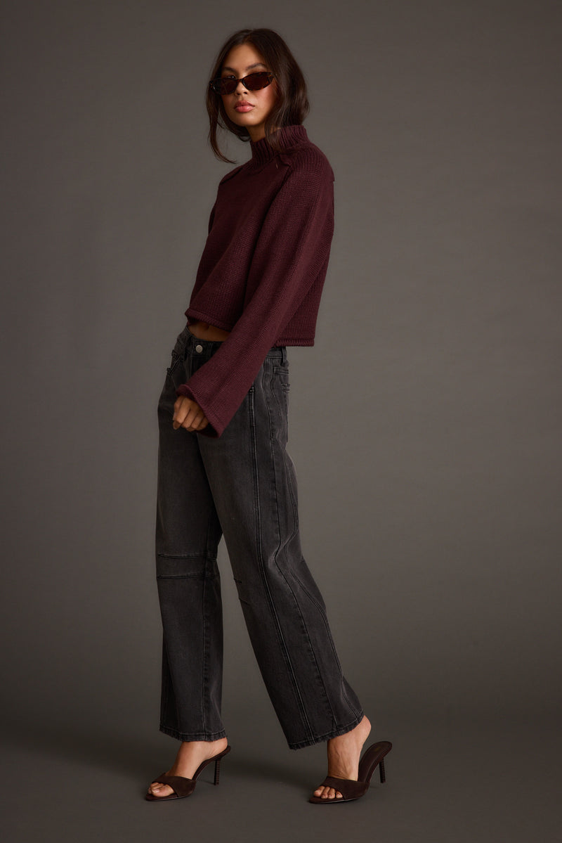Detail shot of the Arden Plum Cropped Sweater highlighting the cropped elements.
