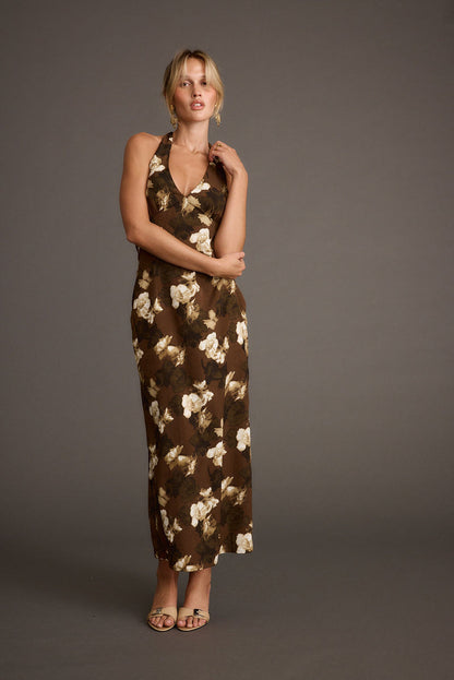 Back view of the brown maxi dress showing the silhouette and fit.