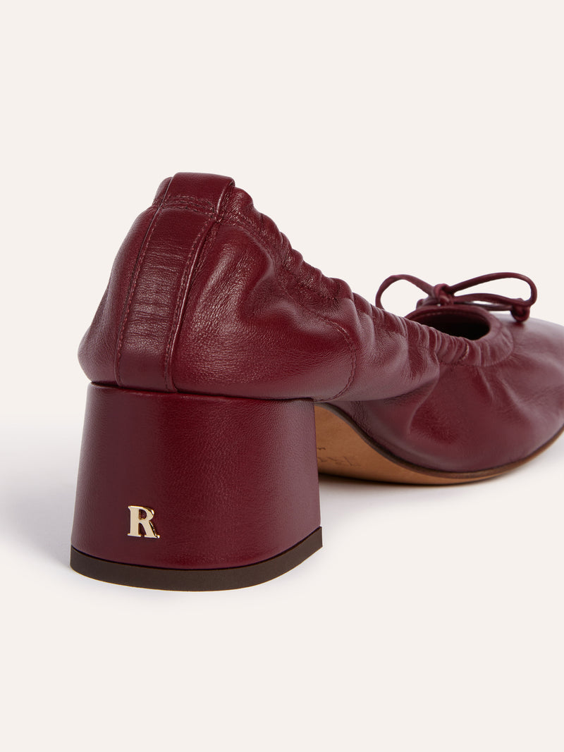 NICOISE burgundy leather ballerinas worn on a model by Rouje
