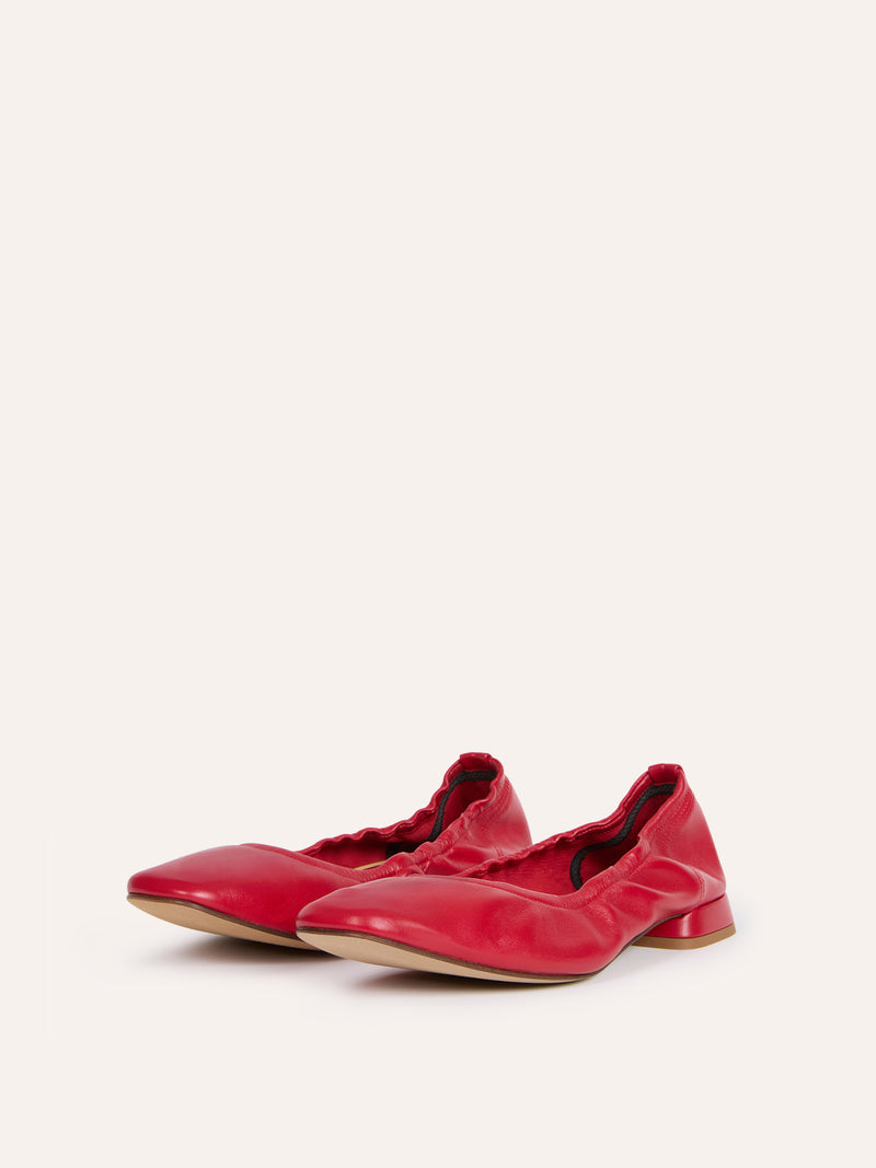 NINA red leather ballerinas worn on a model by Rouje