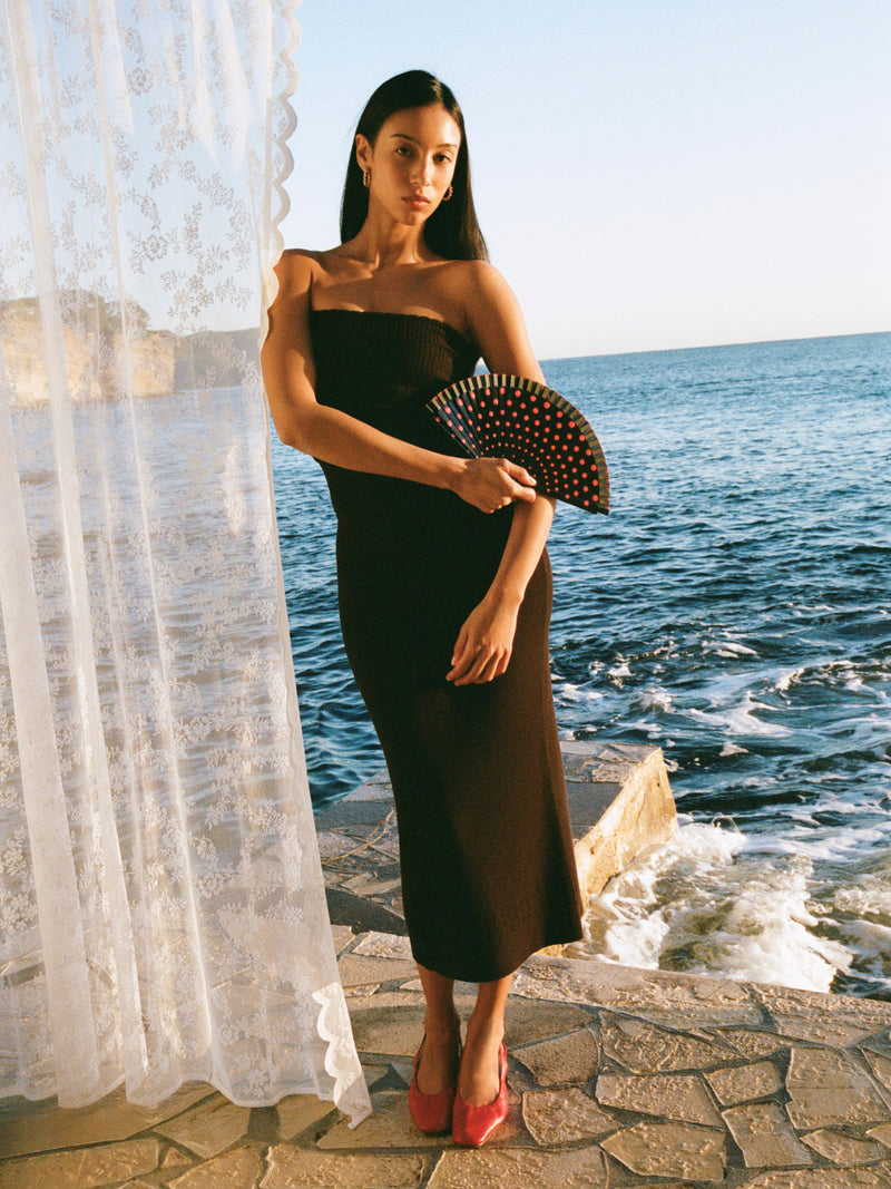 PORTIA brown ribbed knit bandeau bustier top, lifestyle setting by Rouje