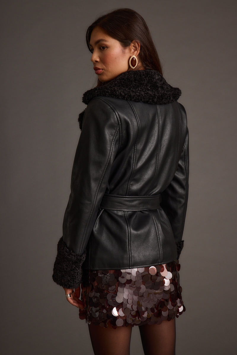 Banks Black Belted Coat paired with complementary accessories for a polished look.