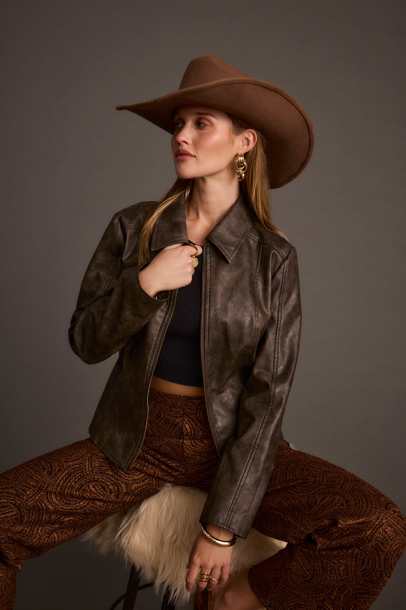 Beckett Espresso Vegan Leather Jacket styled in a complete look from an alternate angle.