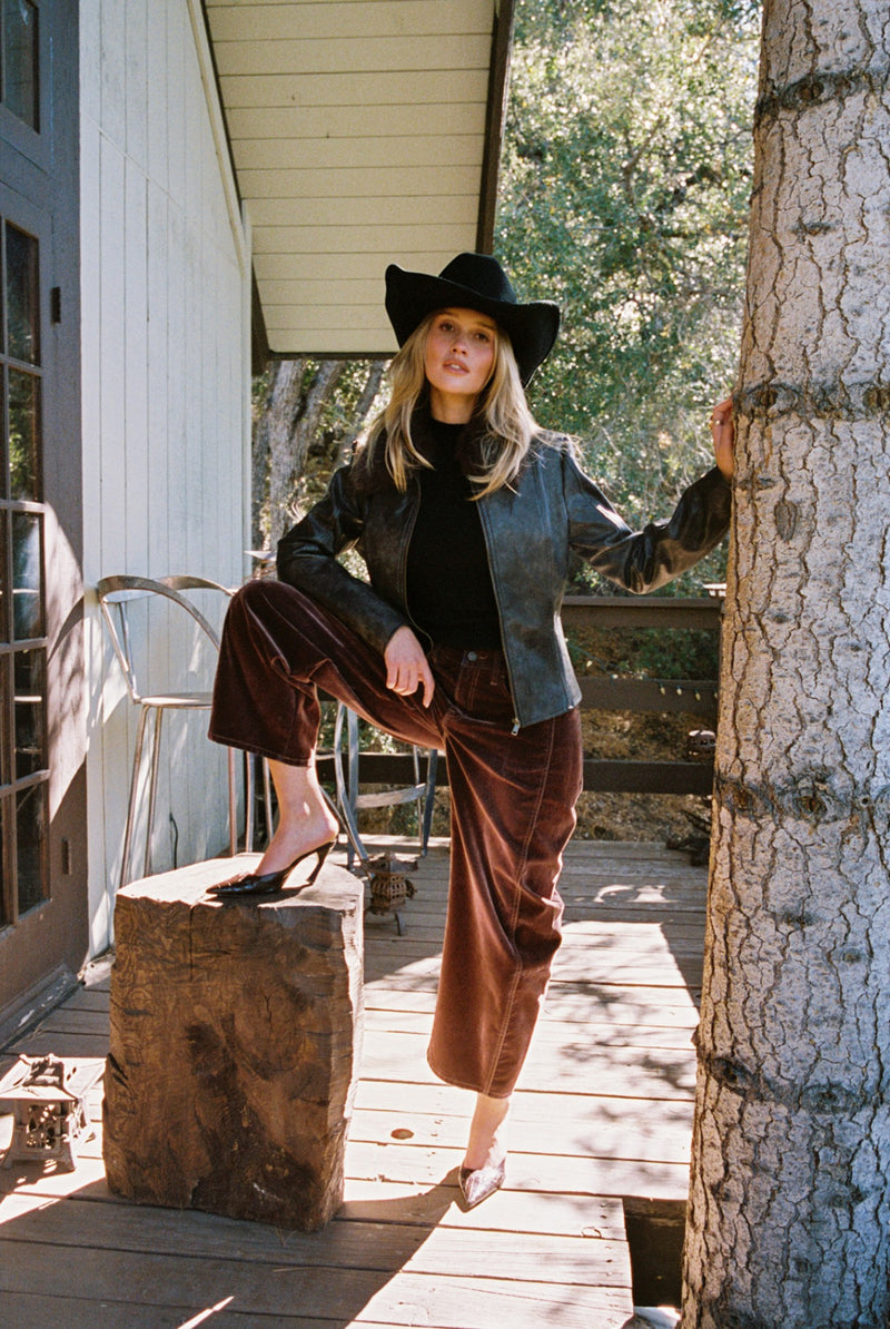 Full-length view of the espresso jacket showing the drape and movement.