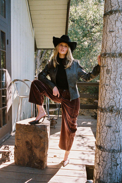 Full-length view of the espresso jacket showing the drape and movement.
