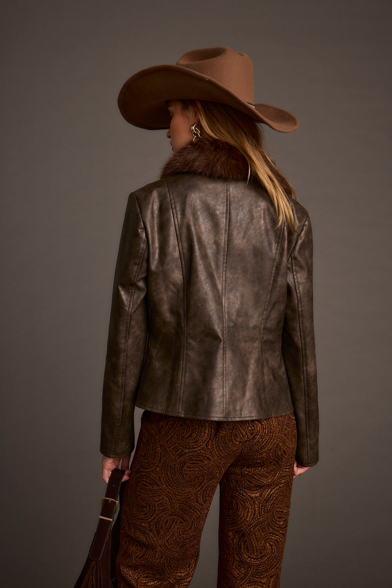 Detail shot of the Beckett Espresso Vegan Leather Jacket highlighting the vegan leather and leather elements.