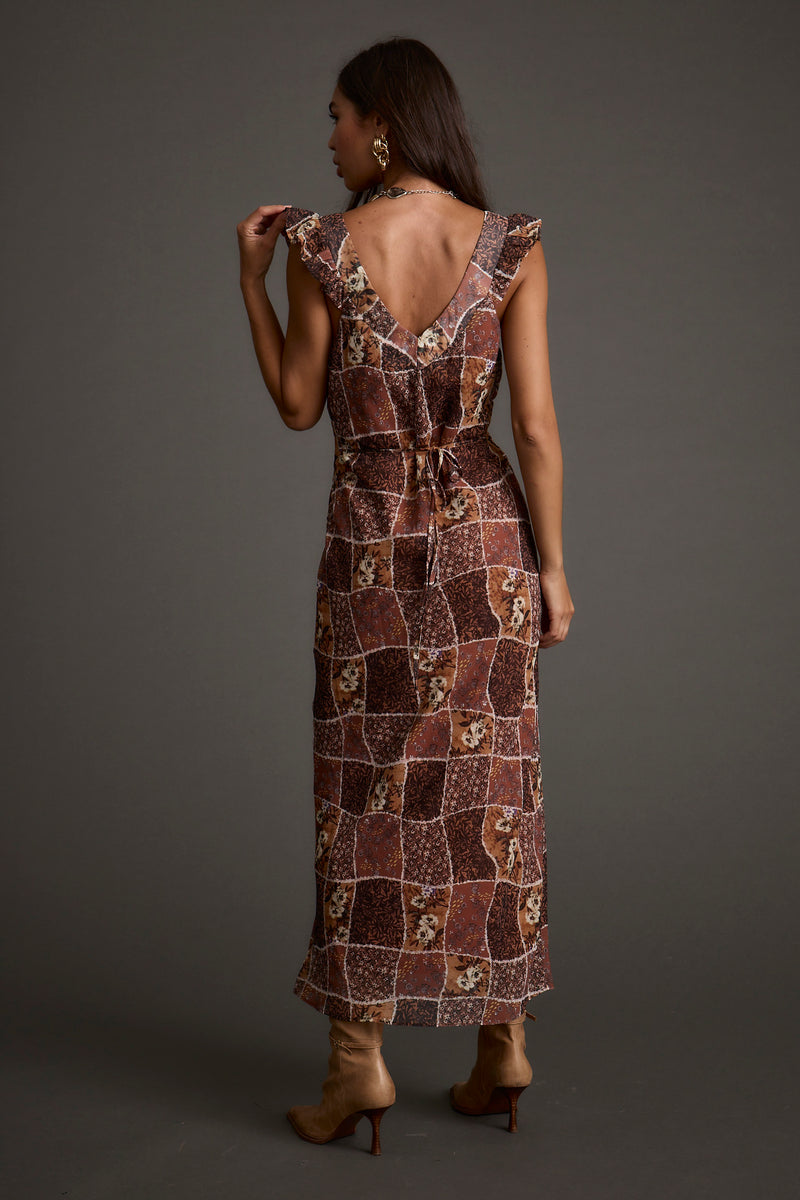 Back view of the midi dress showing the silhouette and fit.
