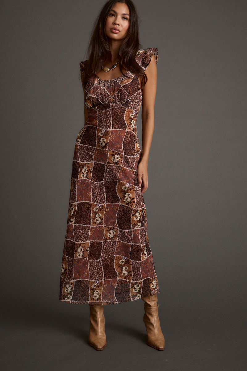 Bree Patchwork Midi Dress paired with complementary accessories for a polished look.
