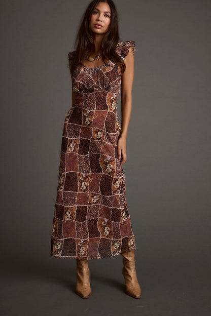 Bree Patchwork Midi Dress paired with complementary accessories for a polished look.