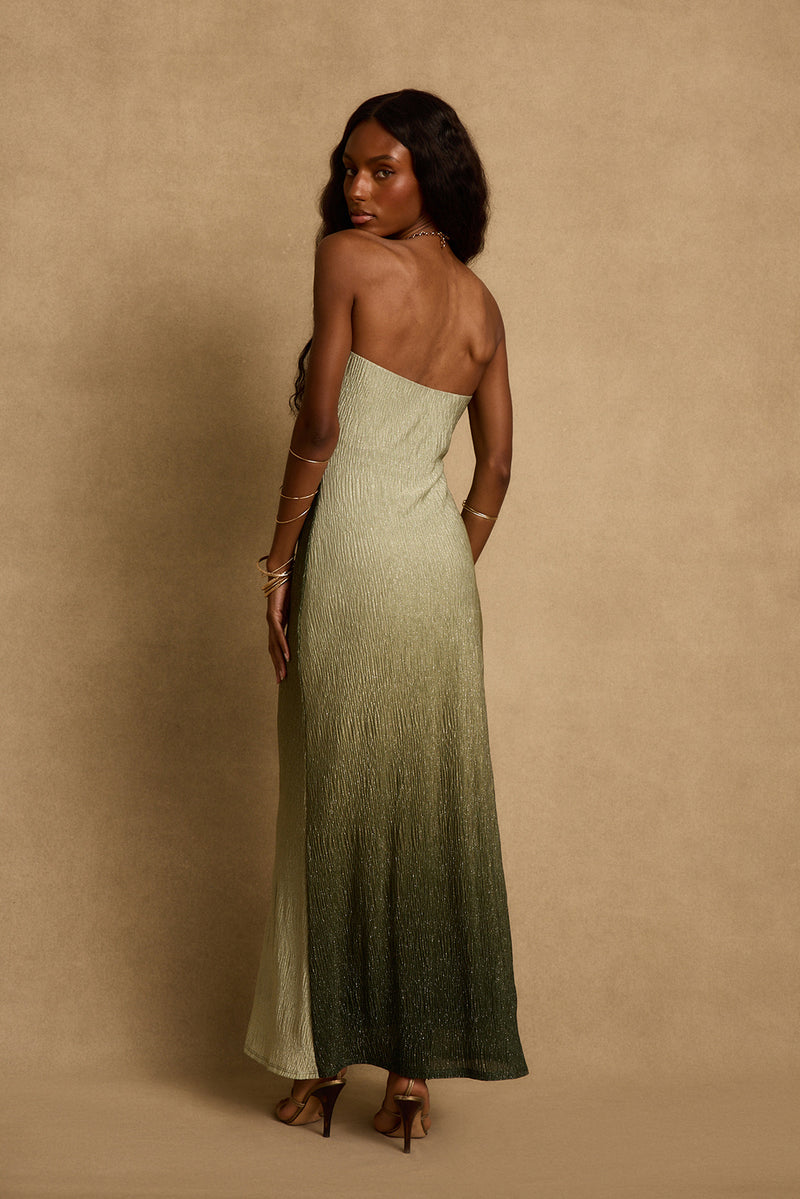 Back view of sage green ombre strapless maxi dress with shimmery textured fabric.