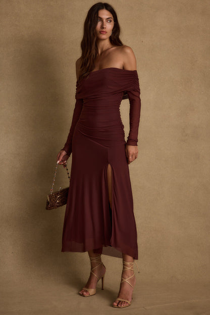Lifestyle shot of the maxi dress styled for day-to-night versatility.