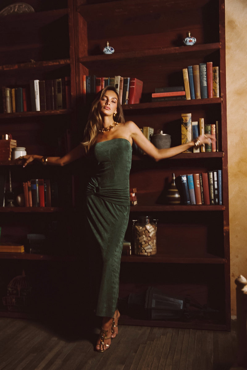 Back view of the emerald maxi dress showing the silhouette and fit.