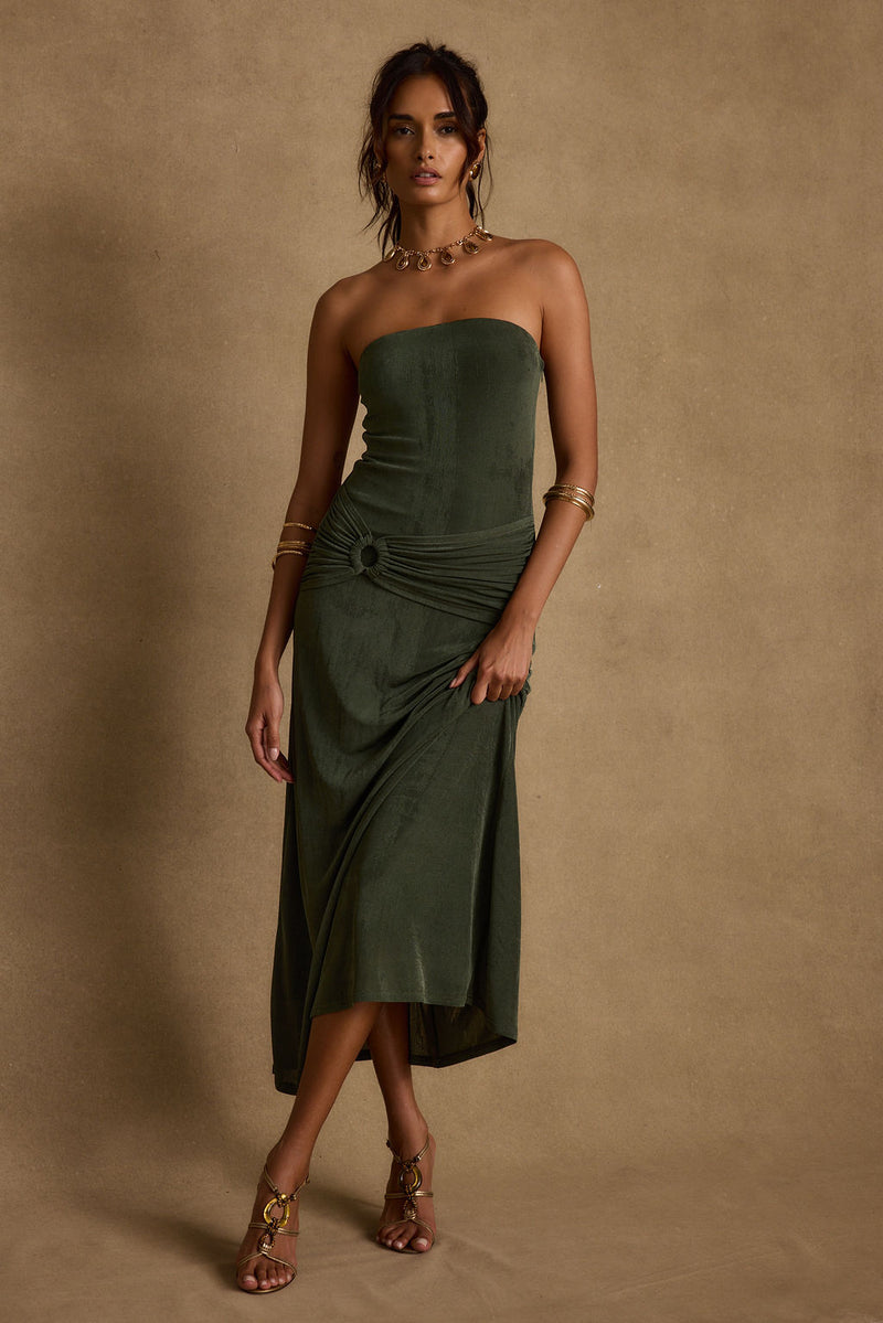 Detail shot of the Cala Sol Emerald Maxi Dress highlighting the design elements.