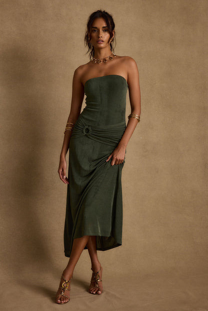 Detail shot of the Cala Sol Emerald Maxi Dress highlighting the design elements.