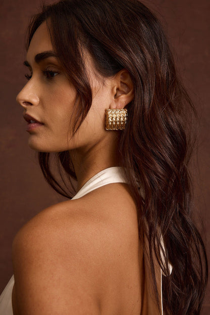 Calaia Gold Earrings paired with complementary accessories for a polished look.