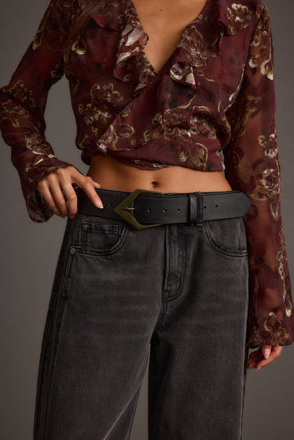 Close-up of the Calder Black Interchangeable Buckle Belt showcasing the fabric texture and design details.