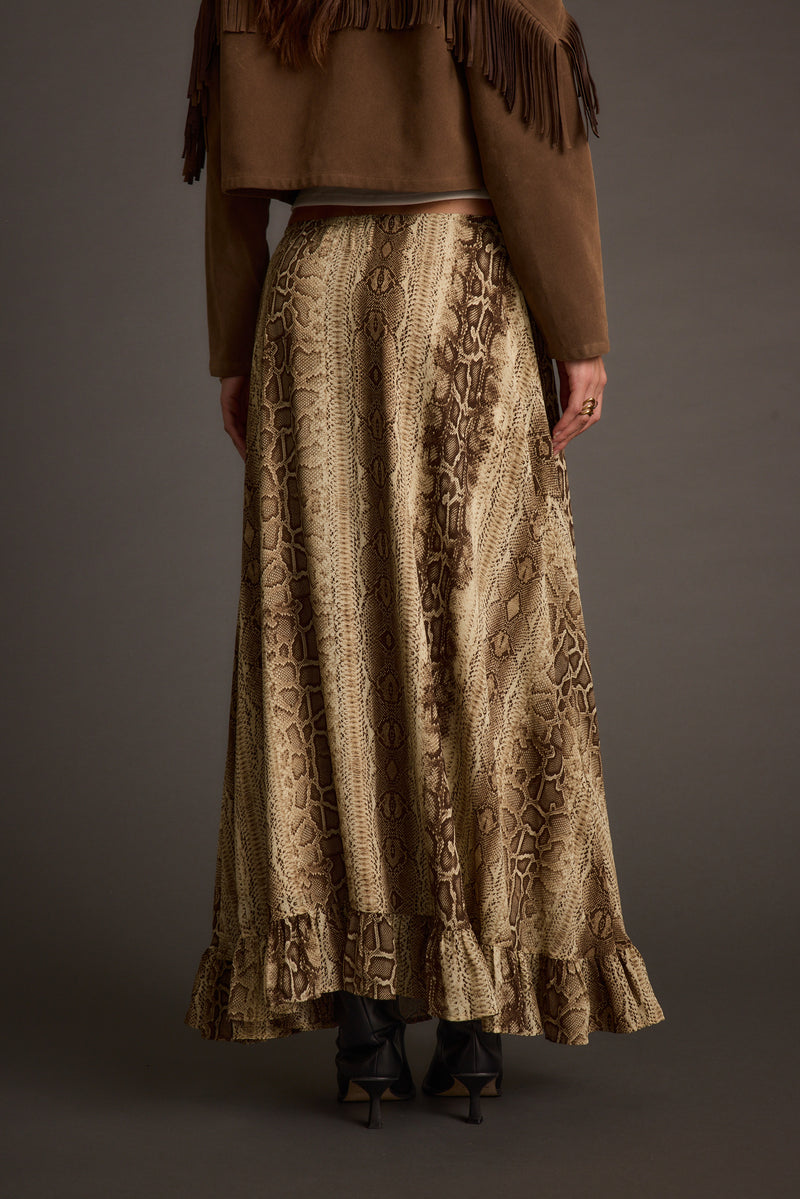 Close-up of the Calla Snake Print Maxi Skirt showcasing the fabric texture and design details.