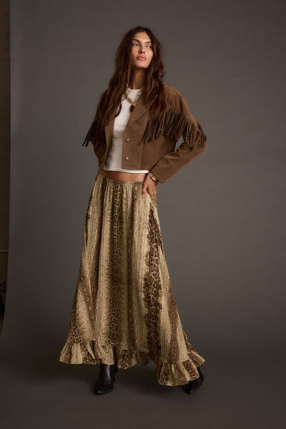 Full-length view of the maxi skirt showing the drape and movement.