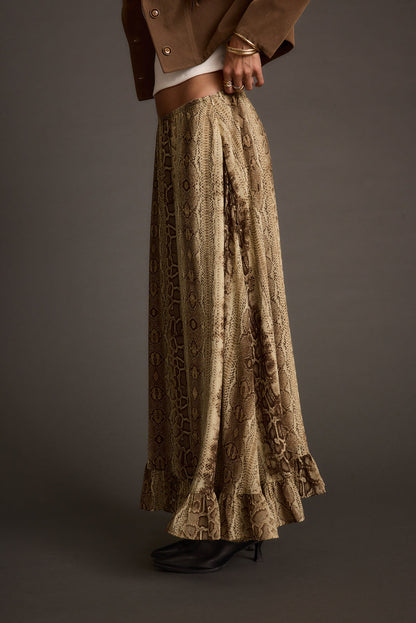 Calla Snake Print Maxi Skirt paired with complementary accessories for a polished look.