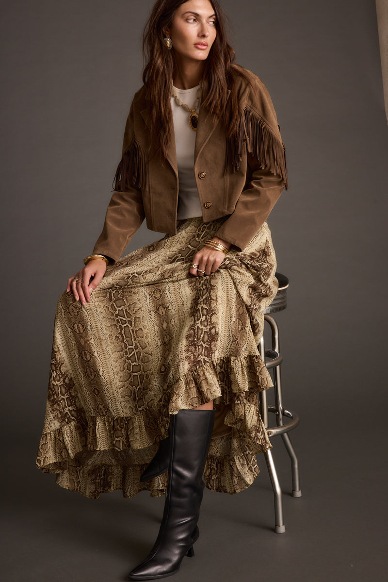 Lifestyle shot of the maxi skirt styled for day-to-night versatility.