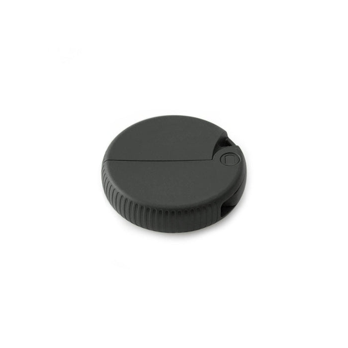 A round black carton opener on white background
