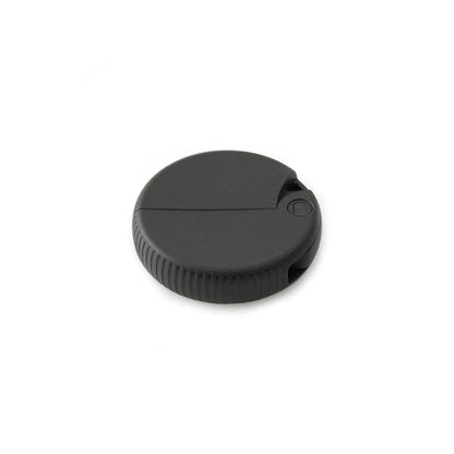 A round black carton opener on white background
