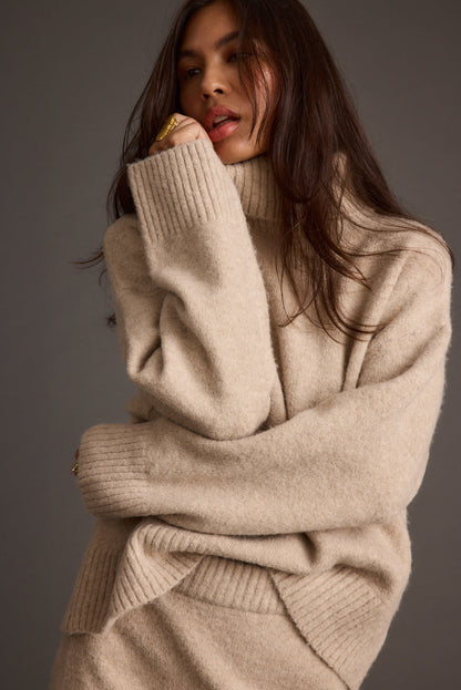 Alternate angle of the sweater highlighting the overall design.