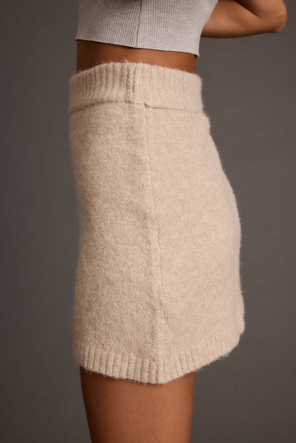 Detail shot of the Cedar Oatmeal Sweater Mini Skirt highlighting the design elements.