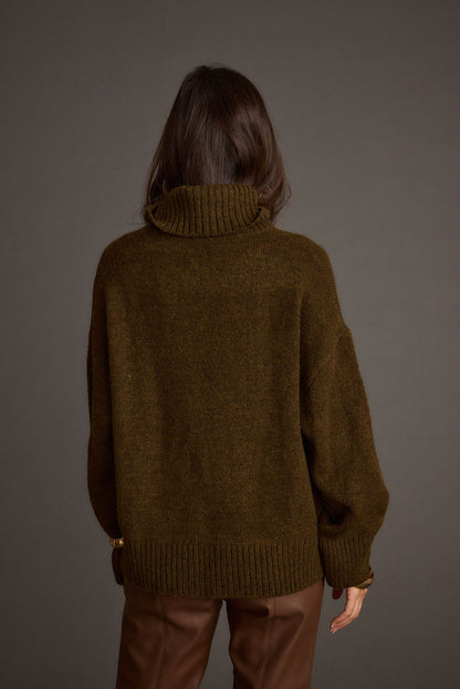 Back view of the sweater showing the silhouette and fit.