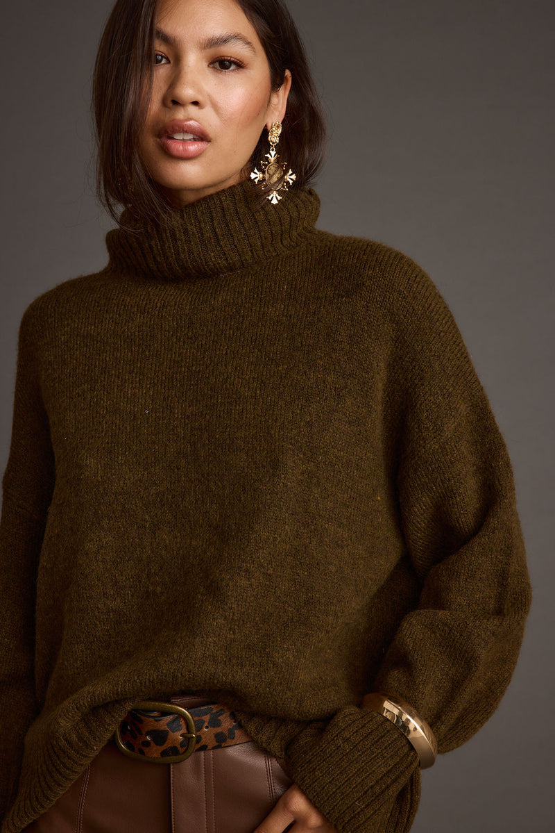 Cedar Oversized Sweater Turtleneck paired with complementary accessories for a polished look.