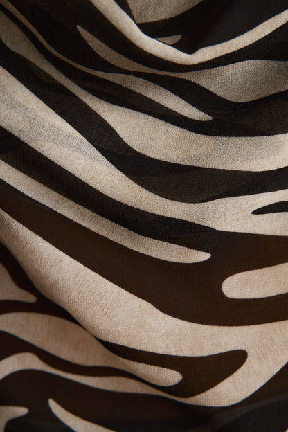 Celia Zebra Maxi Skirt shown in a complementary styling arrangement.
