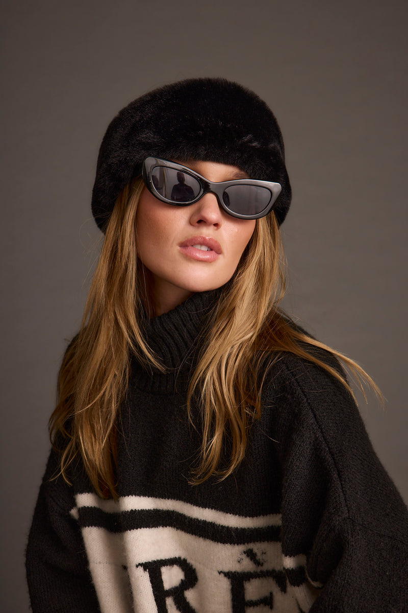 Chalet Black Faux Fur Headband styled in a complete look from an alternate angle.